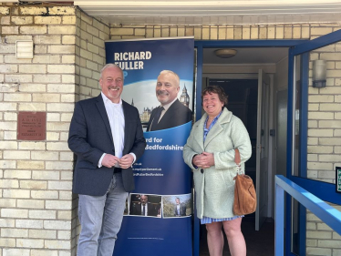 Photo of Richard with Cllr Nicky Gribble outside Ravensden Village Hall